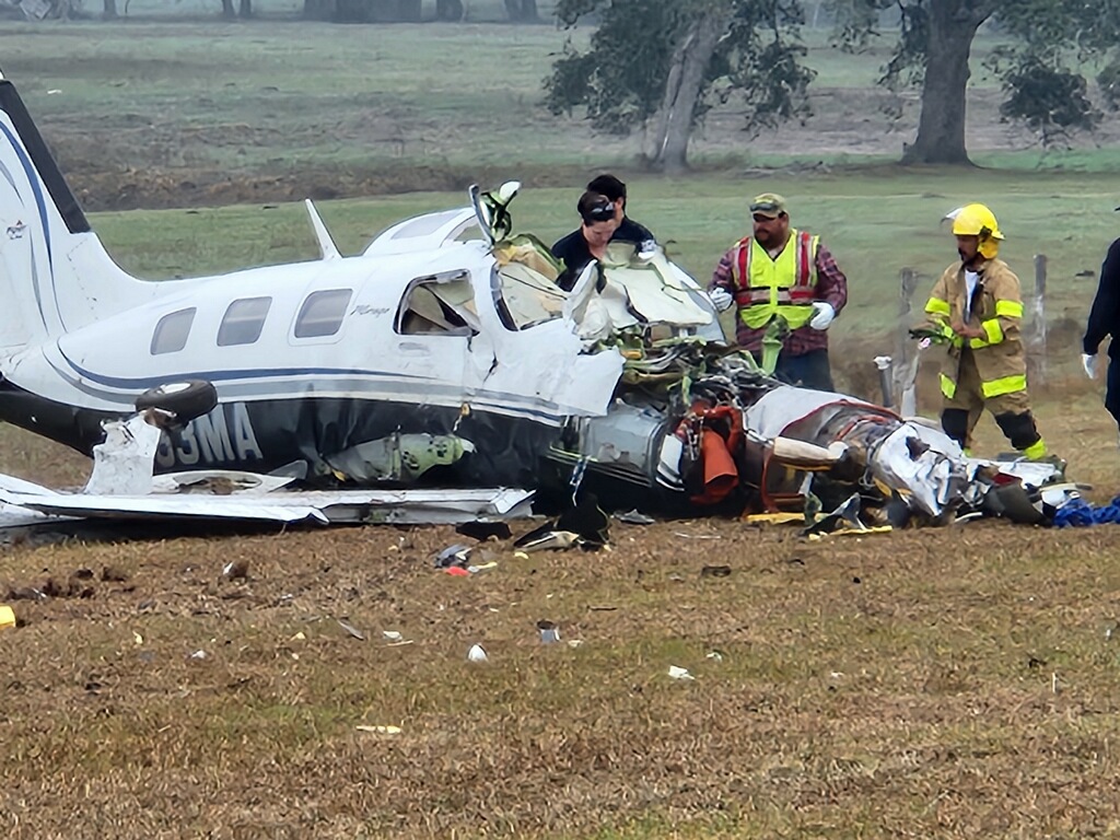 Photo of a plane crash that killed four and injured one.
