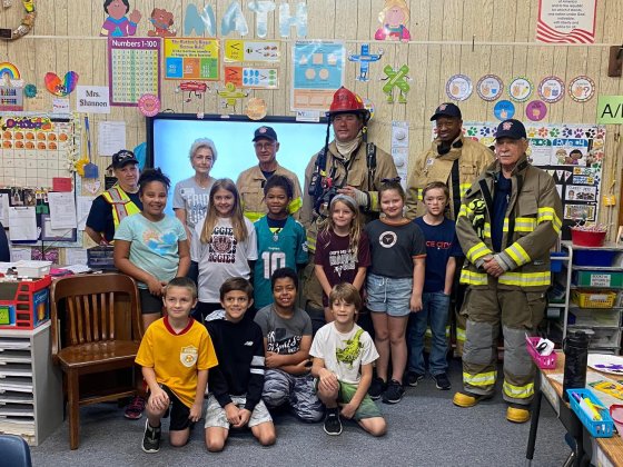 Firefighters visit with Sweet Home ISD students during the recent fire prevention month demonstrations. 