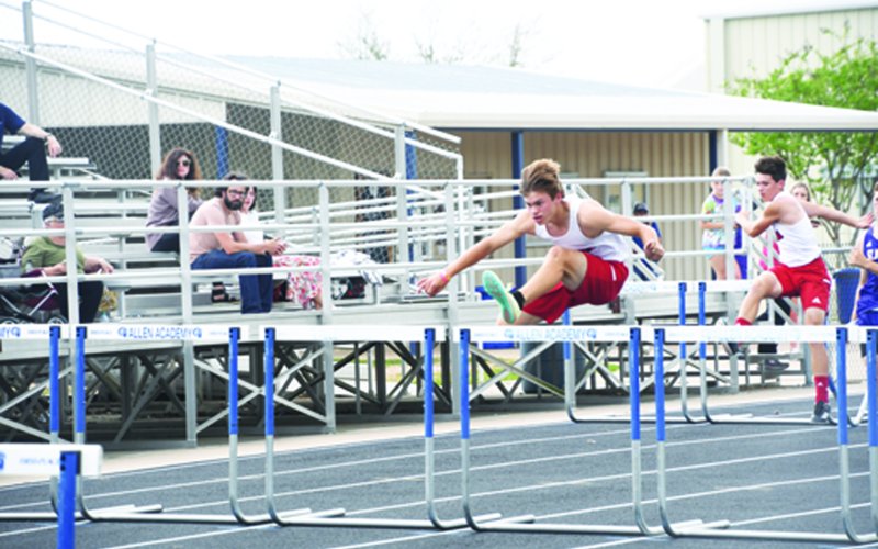 Trent Brown placed first in the 110 hurdles. Photo by Mark Lube.