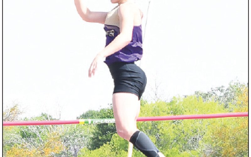 Hayleigh Burns won the pole vault with a height of eight feet, six inches. She will also run the 400 and be part of the milerelay team at the area meet. Photo by Mark Lube.