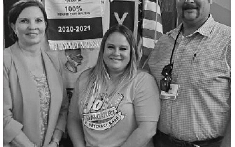Pictured above from left to right are Rotarian Karen Barber, Tierra Jo Furrh, and Michael Furrh. The Furrhs were the guest speakers at the Rotary Club meeting April 7. Pictured at left from left to right are YHS seniors Kylie Velek and Kirsten Smith