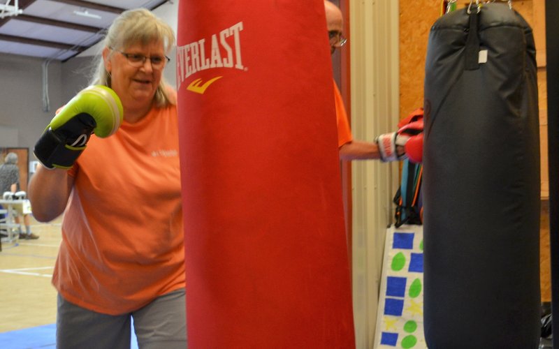Lisa Hermes gears up for another punch during the May 4 Rock Steady Boxing Yoakum training session.