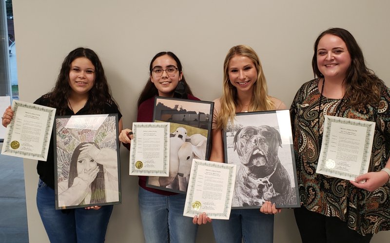 The school board commended several YHS students who excelled at the State Visual Arts Scholastic Event (V.A.S.E).