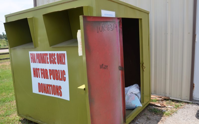 SNYPD accepts donations in the green receptacle outside the warehouse.