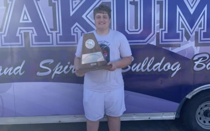 Jordan Ledlow poses with an award from a band compeition. Contributed photo.