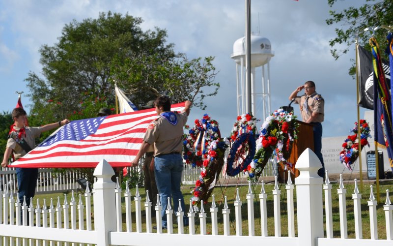 Members of Shiner Scout Troop 231 display the United States flag during Monday’s Memorial Day Tribute in Shiner.