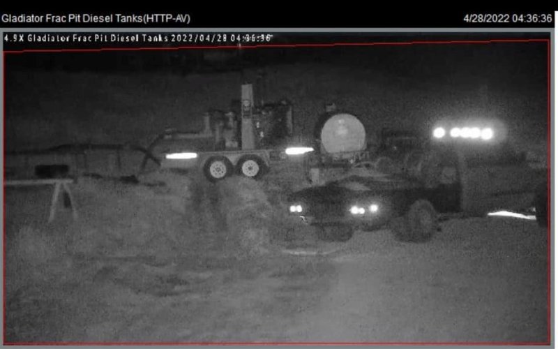 Security cameras captured images of what appears to be a light-colored Dodge cab-and-a-half flatbed pickup, with a fuel tank mounted on the bed, seen on location the day the 500-gallon fuel tank turned up missing.