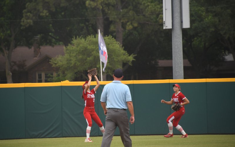 Ashlyn Pesek gets underneath a fly ball against Ovilla Christian in the state final. Photo by Mark Lube.