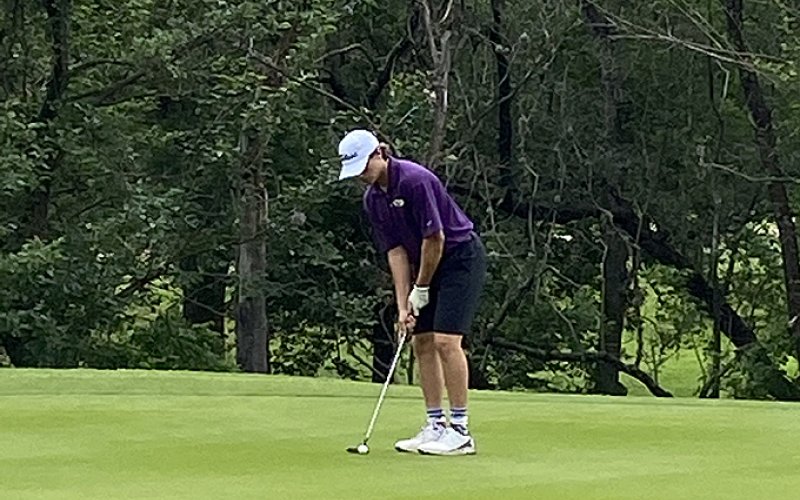 Beck Bishop lines up a shot at the state golf tournament last. Photo courtesy of James Pustka.