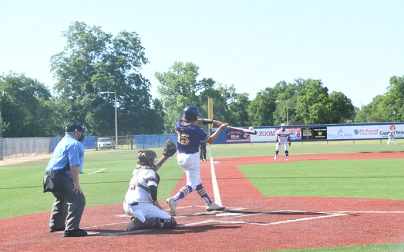 Bryce Nerada makes contact. He was 3-for-4 with two RBI in the series. Photo by Mark Lube.