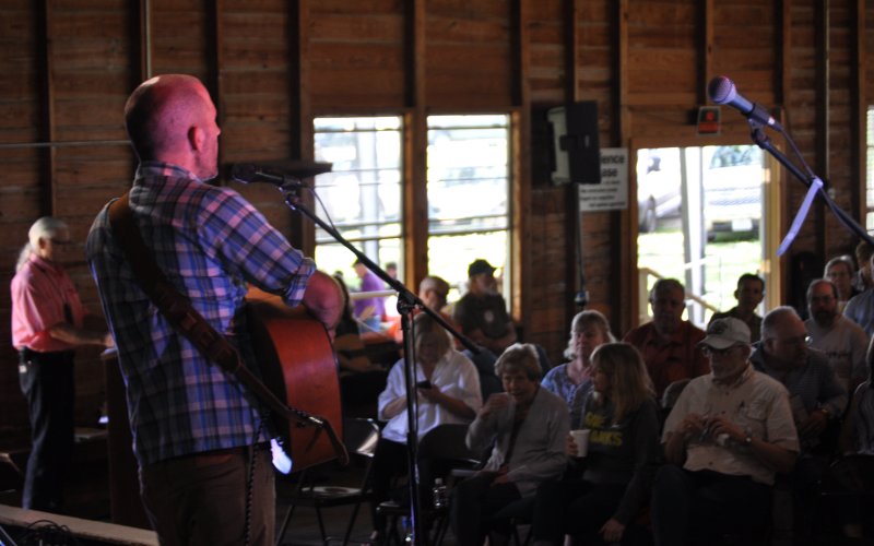 One of the contestants gives his all at the 2019 Songwriter Serenade, held inside the Moravia Catholic Church Parish Hall that year. The event will be just a few miles up FM 957 this year, at the much more spacious, covered outdoor pavilion found at St. John Community. Performances start at 11. a.m.