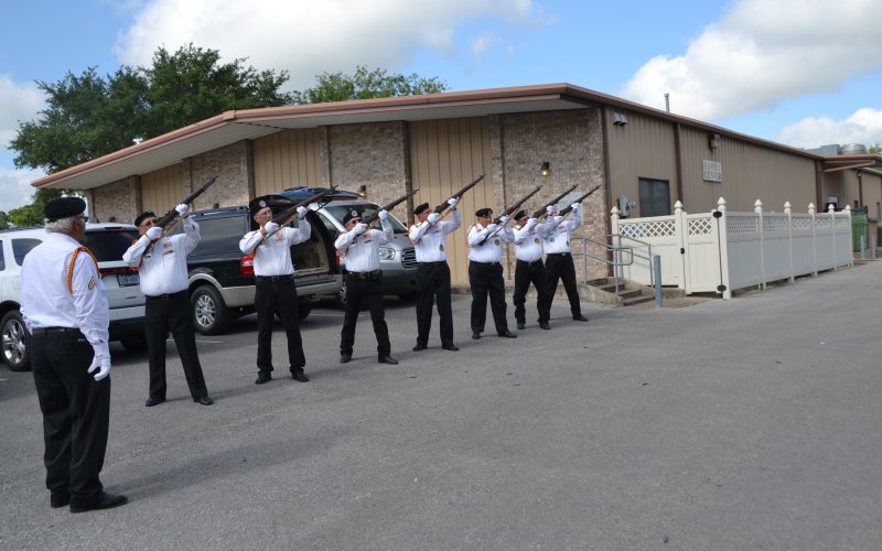 Members of the Vietnam Veterans of America Lone Star Chapter 854 prepare to fire a 21-gun salute during Memorial Day ceremonies in May 2018.