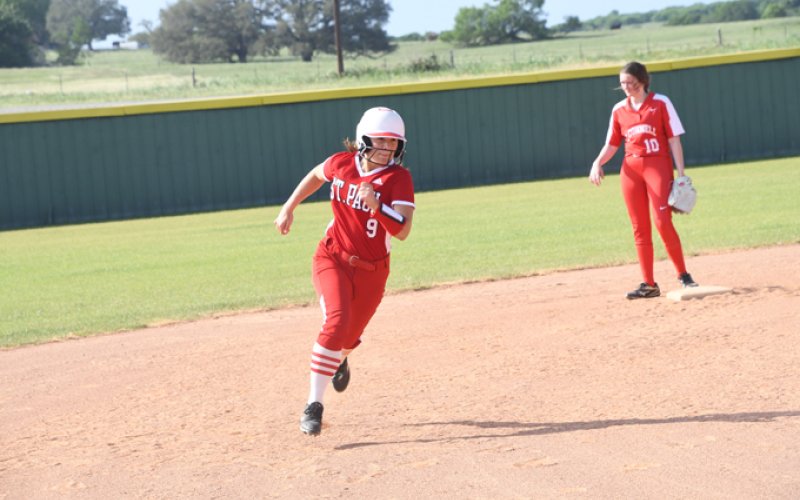 Stefany Pokluda races for third base against O'Connell. She had two home runs. Photo by Mark Lube