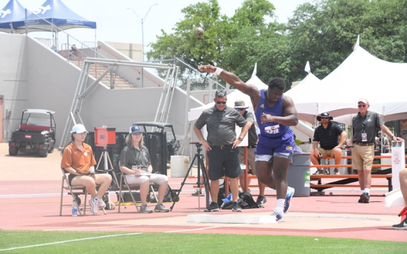 Doug Brook releases the shot put. He had a throw of 56 which was a peronal best. Photo by Mark Lube.