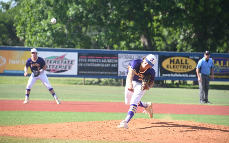 Drew Wenske after releasing a pitch. He had three hits, three runs and nine strikeouts in the second game in seven innings. Photo by Mark Lube
