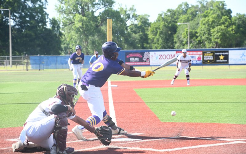 Keenan Hailey with one of his four hits in the second game. He  had a total of five hits, three runs and three RBI in the series. Photo by Mark Lube,