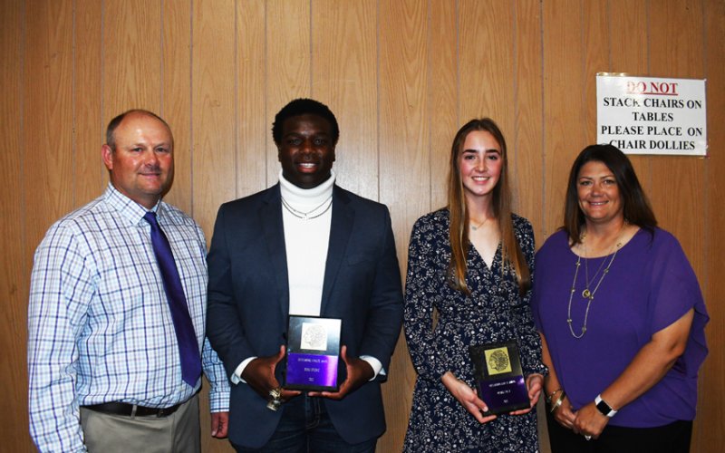 Most Outstanding Athlete. From left is athletic director Daniel Boedeker, Doug Brooks, Megan Epley and coach Desiree Nitsch. Photo by Mark Lube.