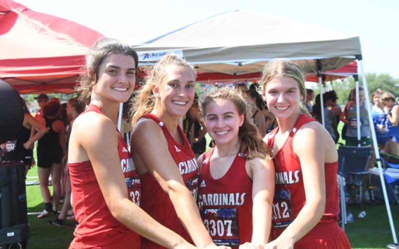 St. Paul Lady Cardinals mile relay, from left is Ashlyn Pesek, Rebecca Wagner, Sarah Barecky and Brooke Cerny. Photo by Mark Lube.