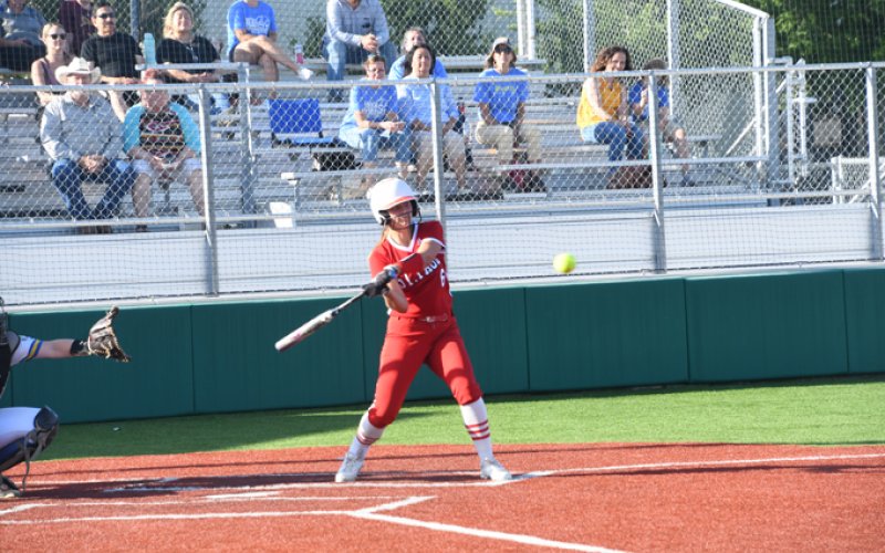 Jessica Fikac swings at a pitch. She had a double, two RBI and scored one run.Photo by Mark Lube