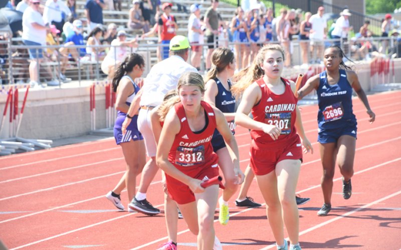 Brooke Cerny (left) and Sarah Barecky in the girls 2A mile relay. Photo by Mark Lube.