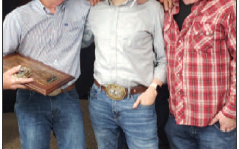 Hopkins, shown with Dennis Ludiker and Jason Andrew along with Kenneth Henneke, one of the founders of the Fiddlers Frolics.