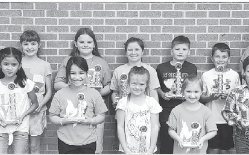Front row from left are: Ayesha Obando, Kaidence Mesa, Jordyn Helfer, Jolee Kuehn, Tate Gonzales. Back row from left are: Lorenzo Tousek, Shelby Rothbauer, Jaycee McGee, Kate Mikulencak, Cullen Mikulencak, Samuel Fishbeck, Chief Tim Koncaba.