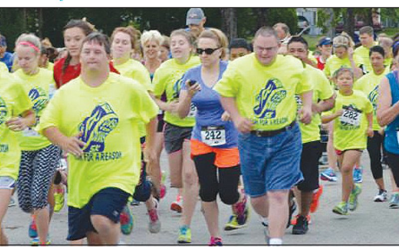 Pictured are walkers and runners participating in the 2014 Dash for Downs. Contributed photo.
