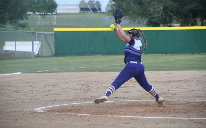 Dyllan Chrismon winds up a pitch in the second game Saturday in Weimar. Photo by Mark Lube.