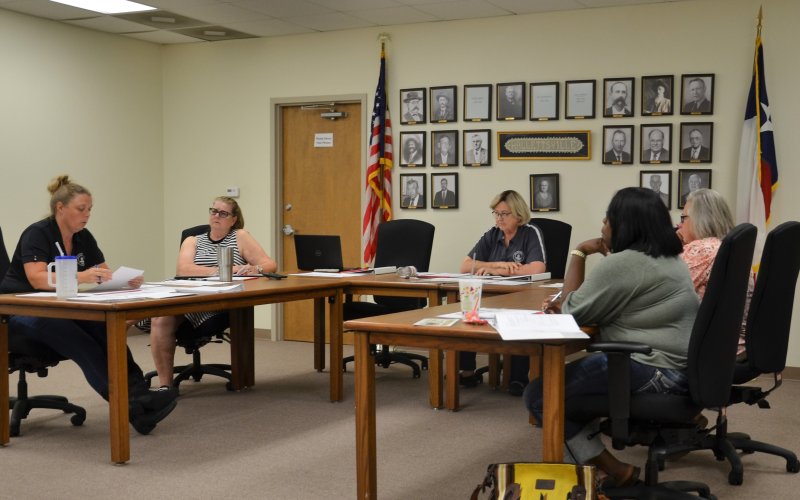 City Administrator Grace Ward discusses the fiscal year 2023 budget expected revenue with the Hallettsville City Council Monday, June 20. Photo by Hans Lammeman.