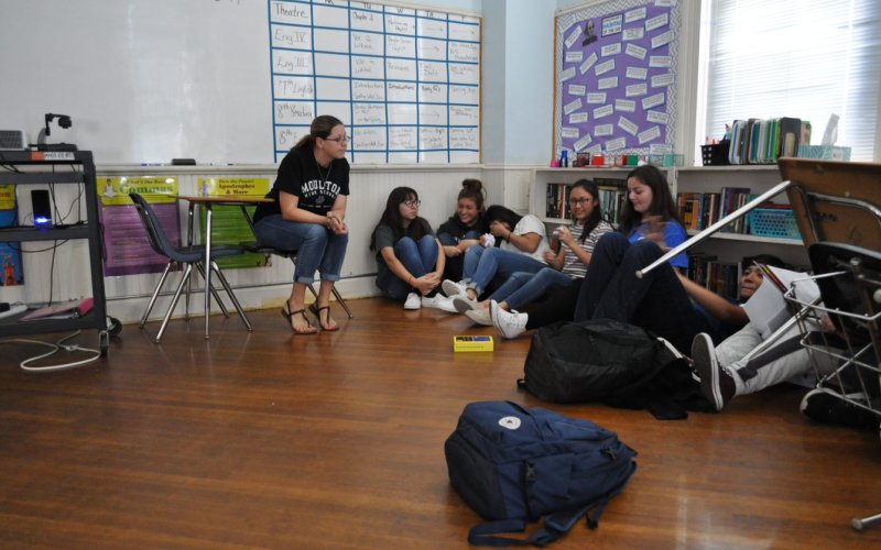 Moutlon High School students review different ways of protecting themselves in case the worst should ever darken their doors in what they call ALICE drills. Here, students get below the windows so they can't be seen from anyone outside the classrooms, as the teacher leads a diuscussion on why that might be important. Photo by Bobby Horecka