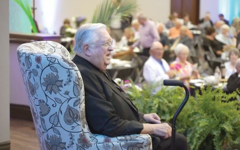 The Rev. Monsignor John Peters, pastor of Sacred Heart in Hallettsville, willingly sat as the target of a little needling, as well as a little praise, for the 2022 Roast and Toast to benefit the Emmaus Counseling Center. Photo by Janet Jones/The Catholic Lighthouse