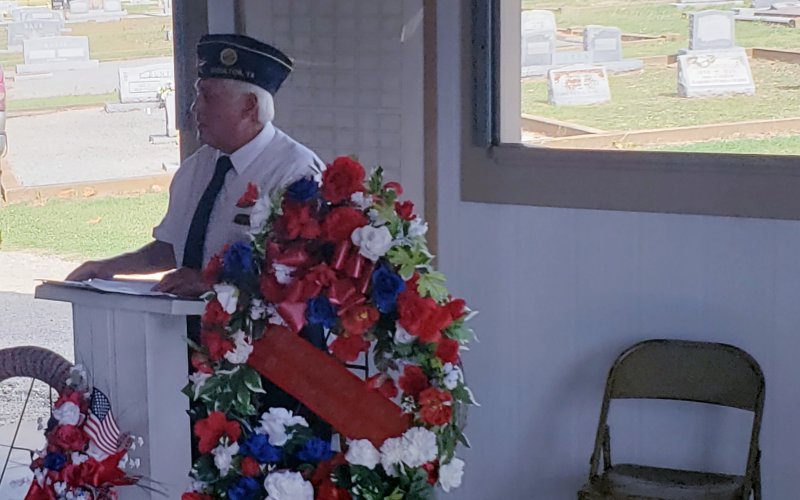 Post Commander Johnnie Dierschke offers a few words of welcome to those who attended Monday's Memorial Day Service in Moulton.