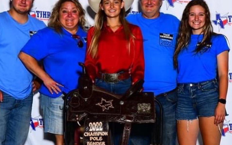 Audrey Thibodeaux &amp; family with her winnings at the state finals.