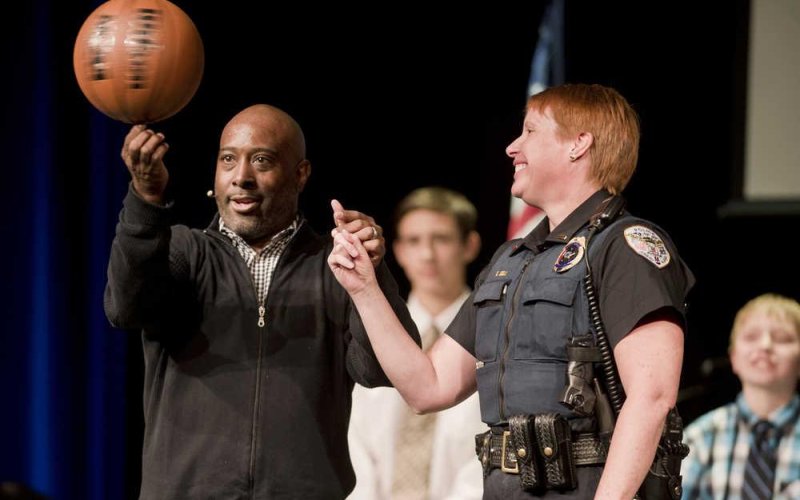 Former NBA player and Harlem Globetrotter Melvin Adams performs while speaking at an event.  Contributed Photo.