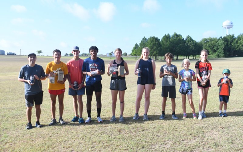 Winners from the Half Moon Holidays 5K held on July 2. Photo by Mark Lube.