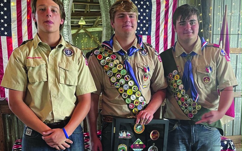Beck Bishop, Dalton Patton and Travis Thibodeaux, left to right, earned the BSA Triple Crown Award.