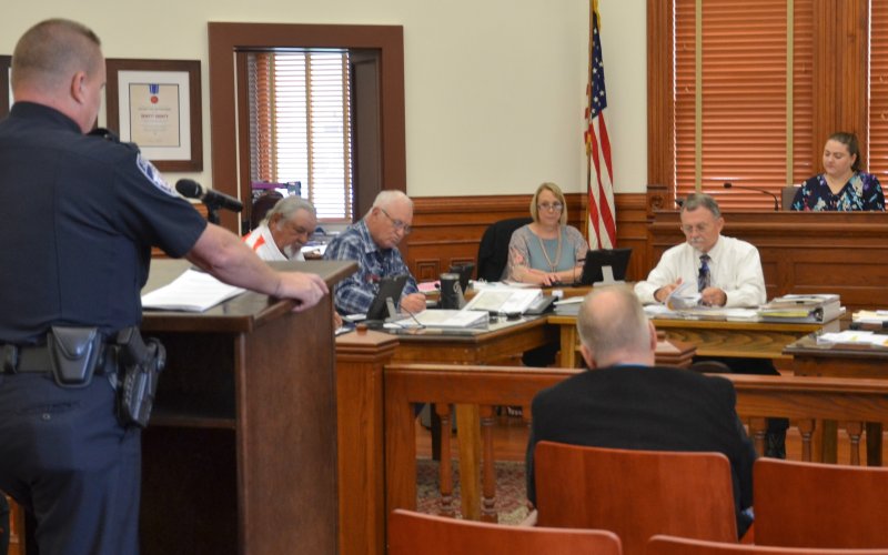 DeWitt County Constable Precinct 1 Kelly Phelps addresses the commissioners court during the proposed tax rate and budget public hearings Aug. 22. Photo by Hans Lammeman.