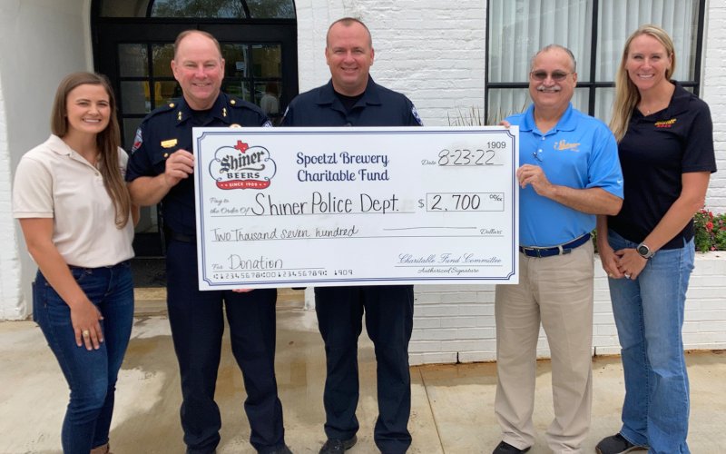 Pictured are, left to right, Lauren Schuette, Shiner Police Chief Kevin Kelso, Sergeant James Whited, Jimmy Mauric and Julie Boehm