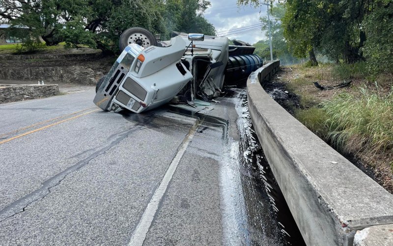 Tanker overturns Sunday coming into LasGrange, spilling oily mud all over the road and requiring specialized HAZMAT team cleanup.