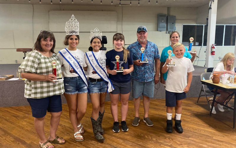 FIRST PLACE: Rose Bartos, Miss Moulton Kaylee Trejo, Junior Miss Valeria Pinedo, Madison Rothbauer, August Bordovsky, Honey Lea Kram and RJ Traylor.