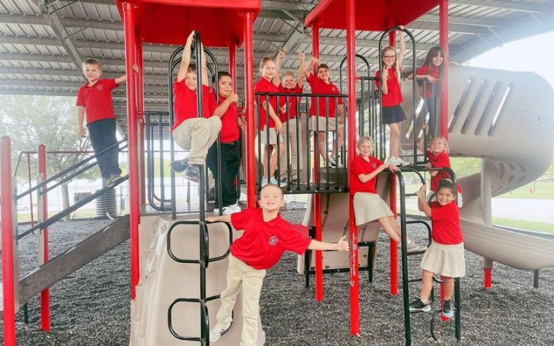 If the weather of late has brought Lavaca County anything, it’s a reprieve from that awful triple digit heat that’s been with us since May. And the third graders over at St. Ludmilla’s Elementary School are about staying cool. So much so, in fact, they took advantage of some of their fine playground equipment recently to take a break from their studies and enjoy a little outdoor time that didn’t leave them melting. On the positive side, current weather forecasts say it should stay this way through Sunday’s
