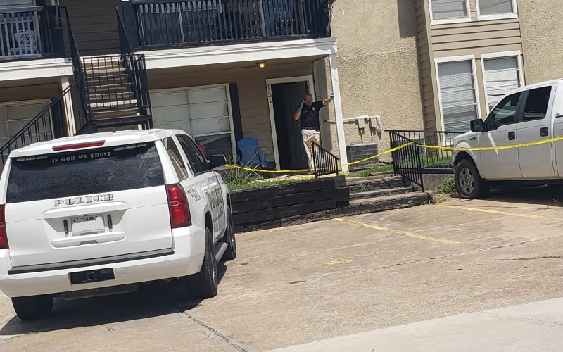 Interim Moulton Police Chief Daniel Beyer fields a call Thursday afternoon while investigating an apartment where a local woman, thought missing, was found on Thursday, having apparently passed away while she slept. Photo by Bobby Horecka
