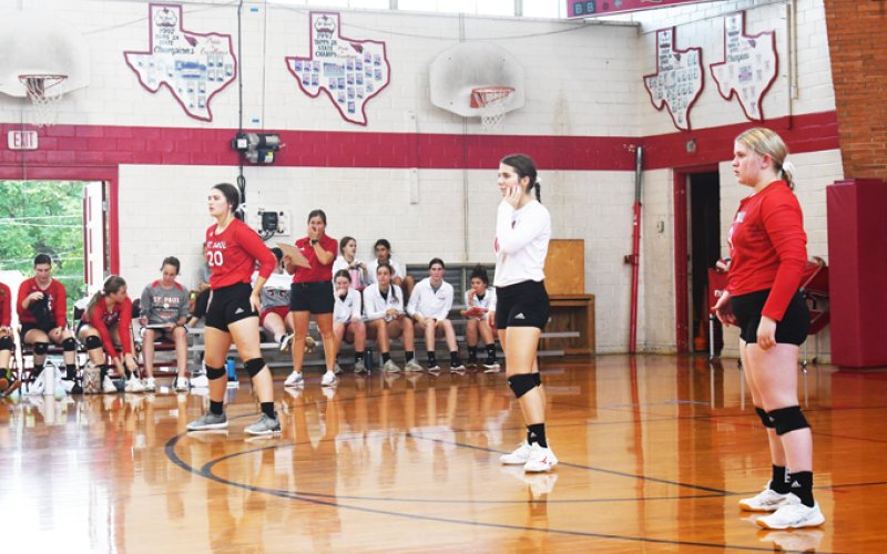 Emily Stamport, Stefany Pokluda and Maurin Knesek, and the rest of St. Paul enjoyed a road district win against Kerrville Lady of the Hills on Tuesday.