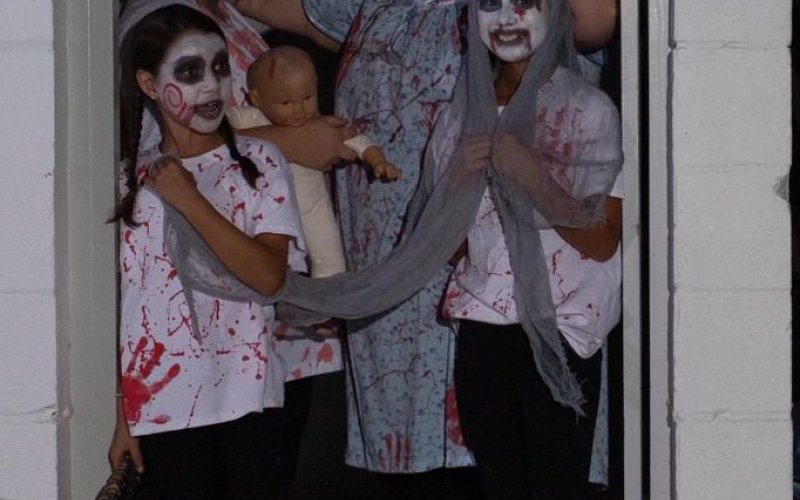 (Top row from left) Brailyn Jalufka, Courtney Henrichs, (Bottom row from left) Chloe Williams and Addyson Williams prepare to scare guests at the Lavaca Swimming Pool in October 2021. Contributed photo.