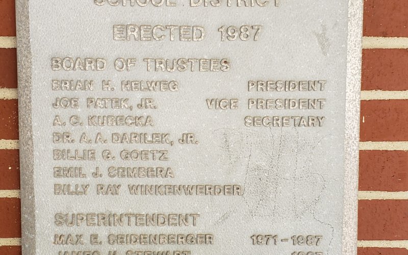Because that octagonal red brick portion has a placard, and it's got names galore...