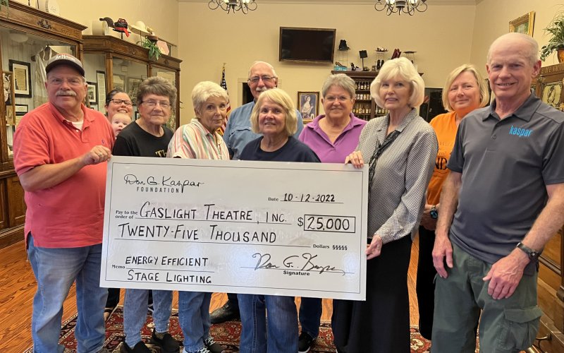 Pictured, left to right, are Gaslight Board members Craig Hughes, Adriana Bridges and son, Ann Moseley, Sandy Machacek, Mike Patek, Linda Leist, Elaine Berkovsky, Toni Rogers, Meredith Hairell and David Kaspar representing the Don G. Kaspar Foundation.