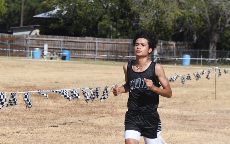 Edgar Mendiola was first overall in the boys varsity. Photo by Mark Lube.