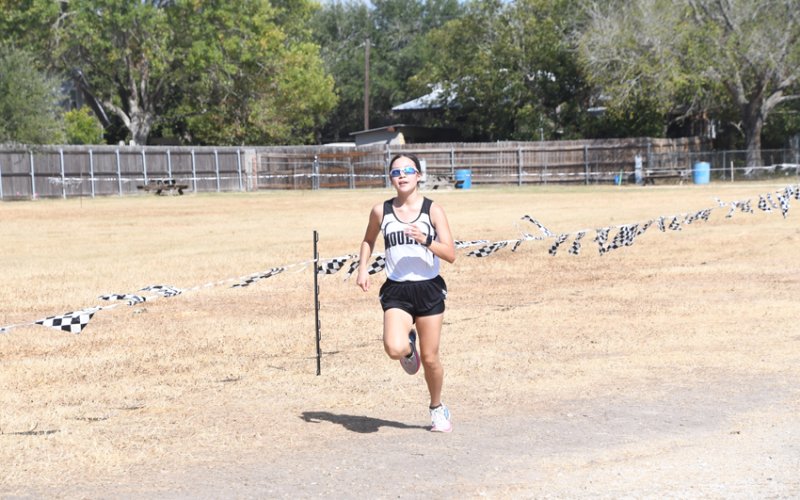 Estefania Colchado was the top finisher for the Kittens with second overall in 14:47. Photo by Mark Lube.
