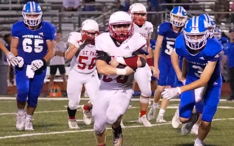 Zane Barta led St. Paul with 200 rushing yards and two touchdowns against Sacred Heart. Photo courtesy of Howard Esse.