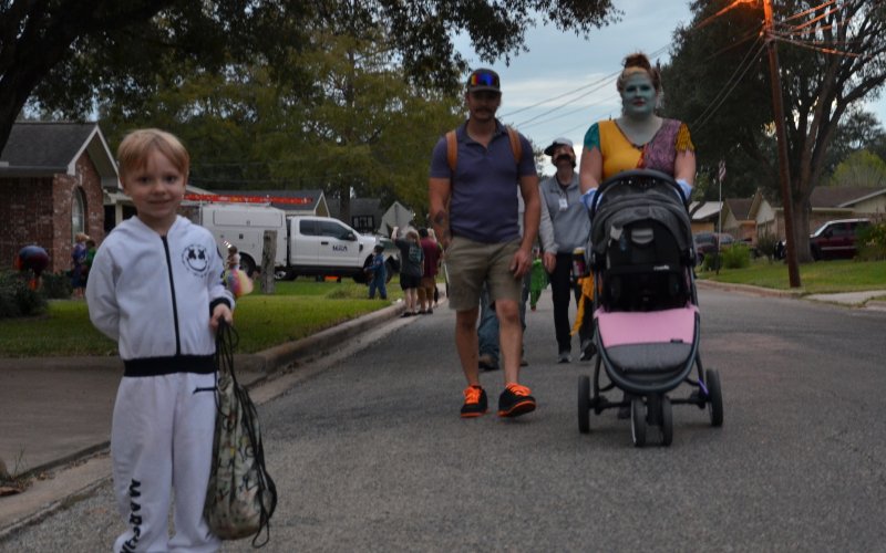 (From left) Johnny Steinhauer, Jerry Steinhauer, and Rachel Harding trick-or-treat through the streets of Hallettsville Monday, Oct. 31.